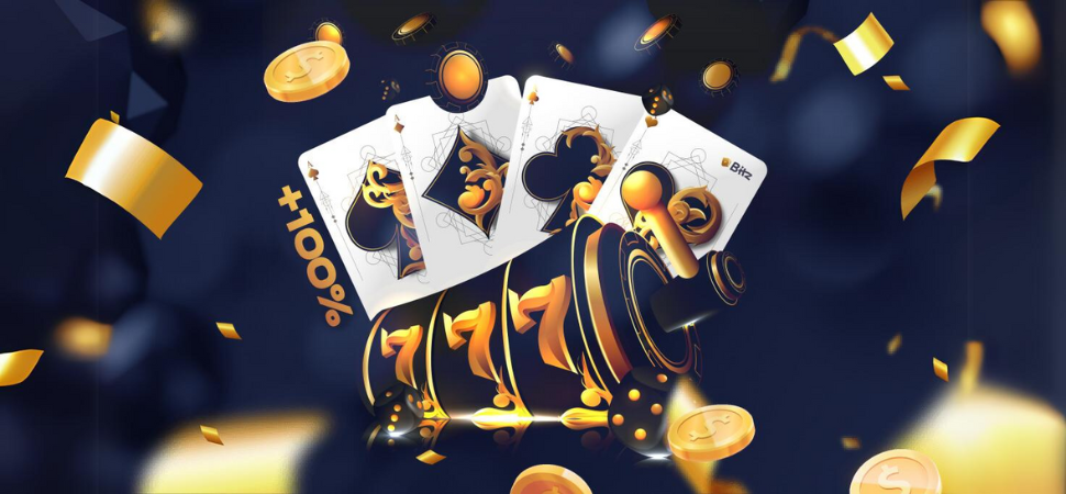 Вітальний бонус Bitz Casino — банер з золотими жетонами, гральними картами та написом +100%